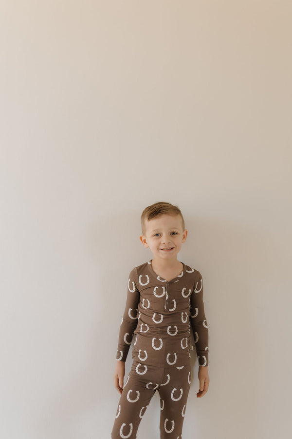 Bamboo two-piece pajamas for babies by Giddy Up, featuring a cozy design and soft fabric, angle view 6.