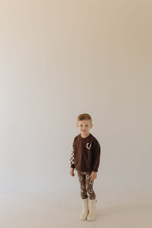 Bamboo two-piece pajamas for babies by Giddy Up, featuring a cozy design and soft fabric.