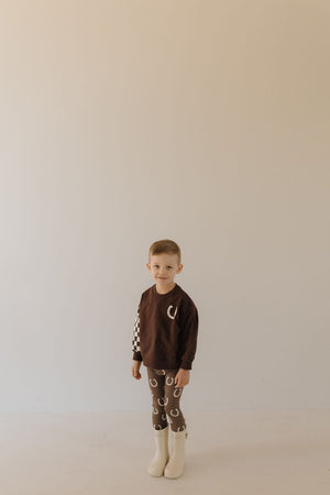 Bamboo two-piece pajamas for babies by Giddy Up, featuring a cute design and soft fabric.