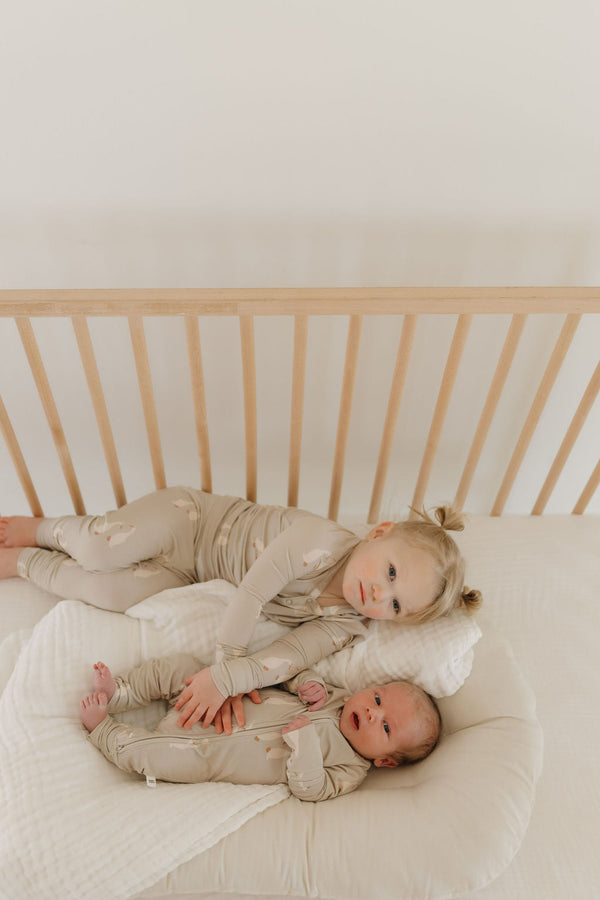 Bamboo Zip Pajamas by Silly Goose, angle view showcasing soft, eco-friendly fabric for babies.