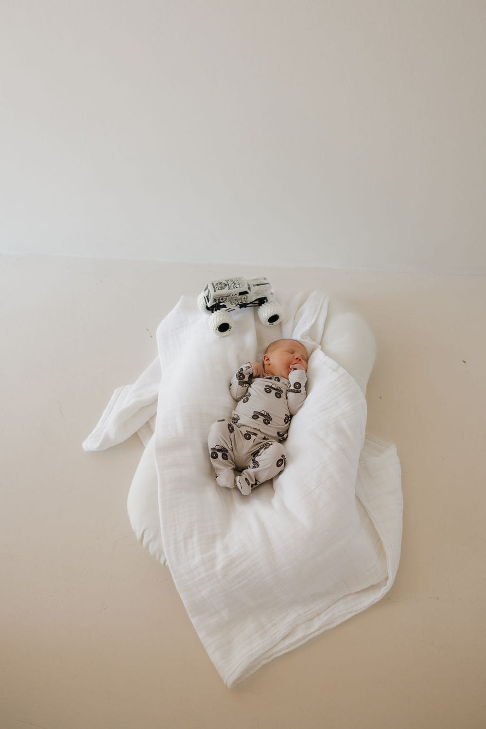 Sleepy Time Set featuring a cozy Monster Truck design for a fun and restful sleep experience for babies.