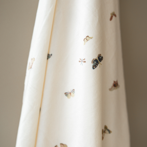 Minky Stretch Luxe Swaddle Blanket in soft fabric, perfect for keeping your baby cozy and comfortable.