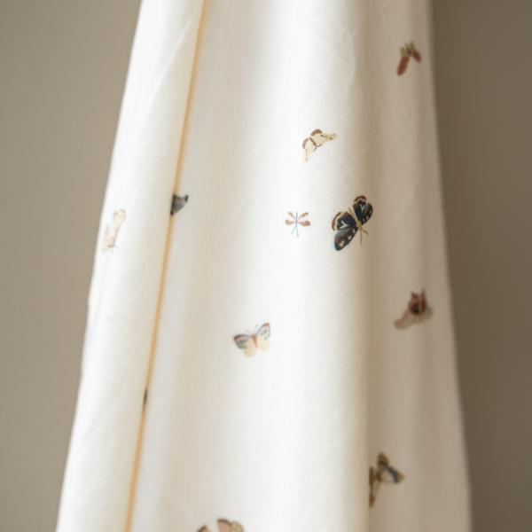 Minky Stretch Luxe Swaddle Blanket in soft fabric, perfect for keeping your baby cozy and comfortable.