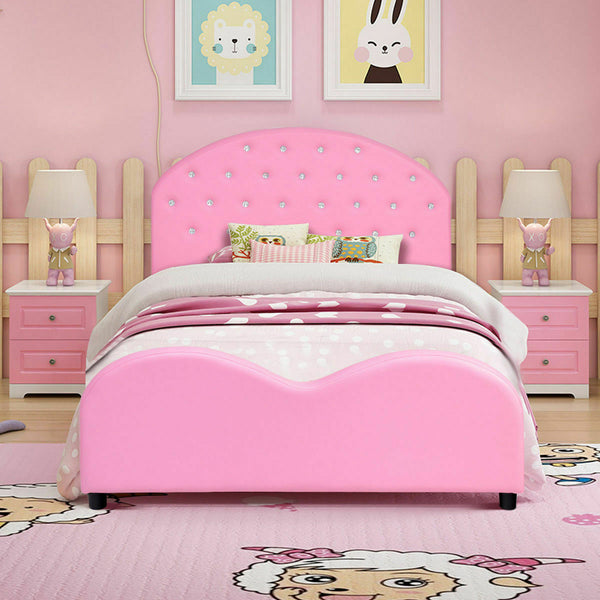 Twin size upholstered toddler bed with wood slat support, angled view showcasing design and comfort for kids' sleep.