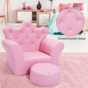 Pink kids sofa with armrests and ottoman, perfect for children's rooms and play areas. Angle view showcasing design.