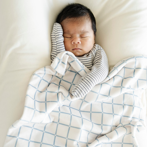 Soft Minky Stretch Receiving Blankets in a cozy angle, perfect for swaddling and keeping your baby warm.