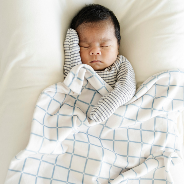 Soft Minky Stretch Receiving Blankets in a cozy angle, perfect for swaddling and keeping your baby warm.
