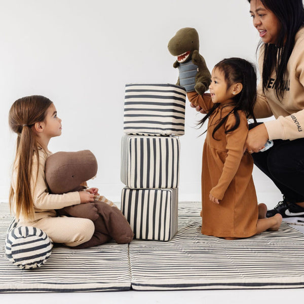 Bold Stripe Organic Cotton Mat for babies, featuring vibrant colors and soft texture, perfect for playtime. Angle 4 view.