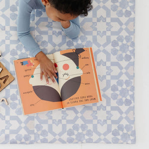 Blue tile vegan leather play mat at angle 3, perfect for babies and toddlers to play safely and comfortably.