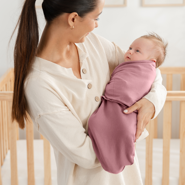 Easy Swaddle Blankets in Blush, Mauve, Mulberry - Pack of 3, shown at an angle. Perfect for cozy baby swaddling.