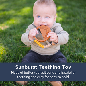 Sage Sunburst Teething Toy at angle 2, perfect for soothing baby's gums during teething.