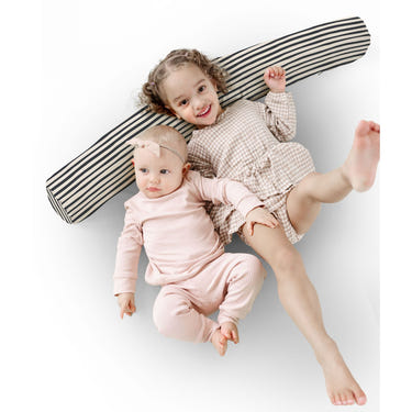 Bold Stripe Support Pillow for nursing, providing comfort and support for moms and babies during feeding sessions.