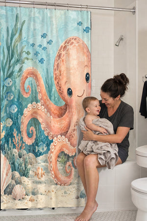 Mom holding her baby on the tub edge next to the Friendly Octopus Ocean shower curtain