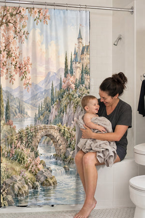 Mom holding her baby on the tub edge next to the Woodland Castle Fairy Tale shower curtain