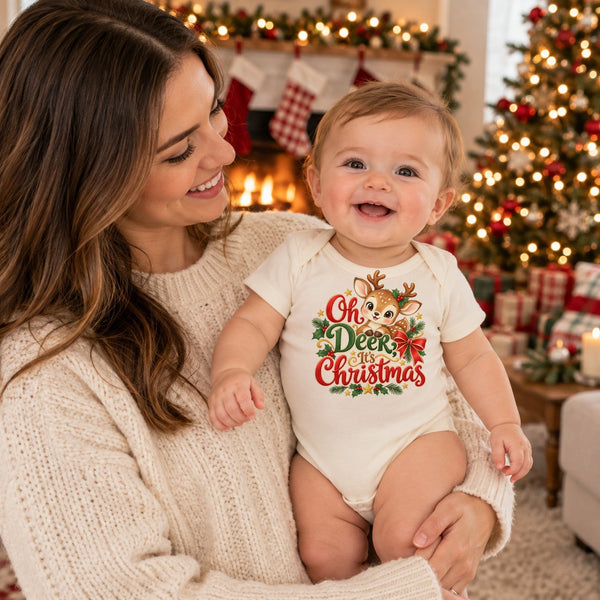 Child wearing the Oh Deer, It's Christmas organic cotton baby bodysuit at Christmas