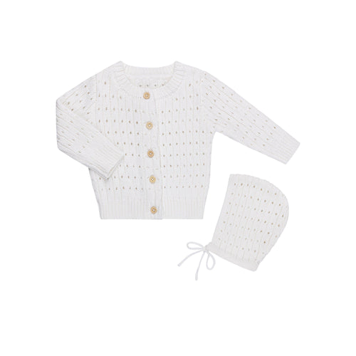 Baby pointelle knit cardigan in soft fabric, shown from angle 3, perfect for cozy layering.