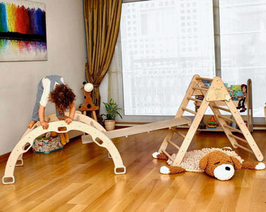 Montessori climbing set with Pikler triangle, climbing arch, and ramp for active baby play and development.