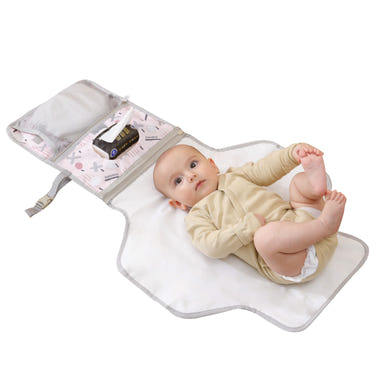 Foldable changing pad for easy diaper changes on the go, featuring a compact design and soft, wipeable surface.