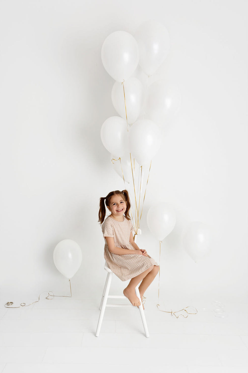 Grid Dress in Sand for babies - stylish and comfortable dress for little ones. Perfect for any occasion.