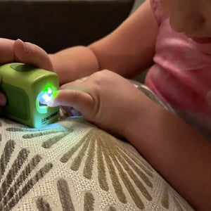 Adaptive electric nail clipper for kids with disabilities, Child Pro Pod Base, angle view. Safe and easy for ages 5-13.