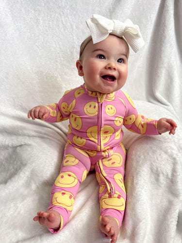 Pink Lemonade Zippy baby bedding set, featuring a vibrant pink design for cozy and stylish sleep.