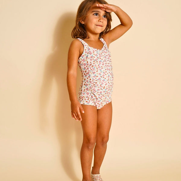 Vintage girls' 1 piece swimsuit in Sunset Meadow, UPF protected, eco-friendly design, shown from angle 3.