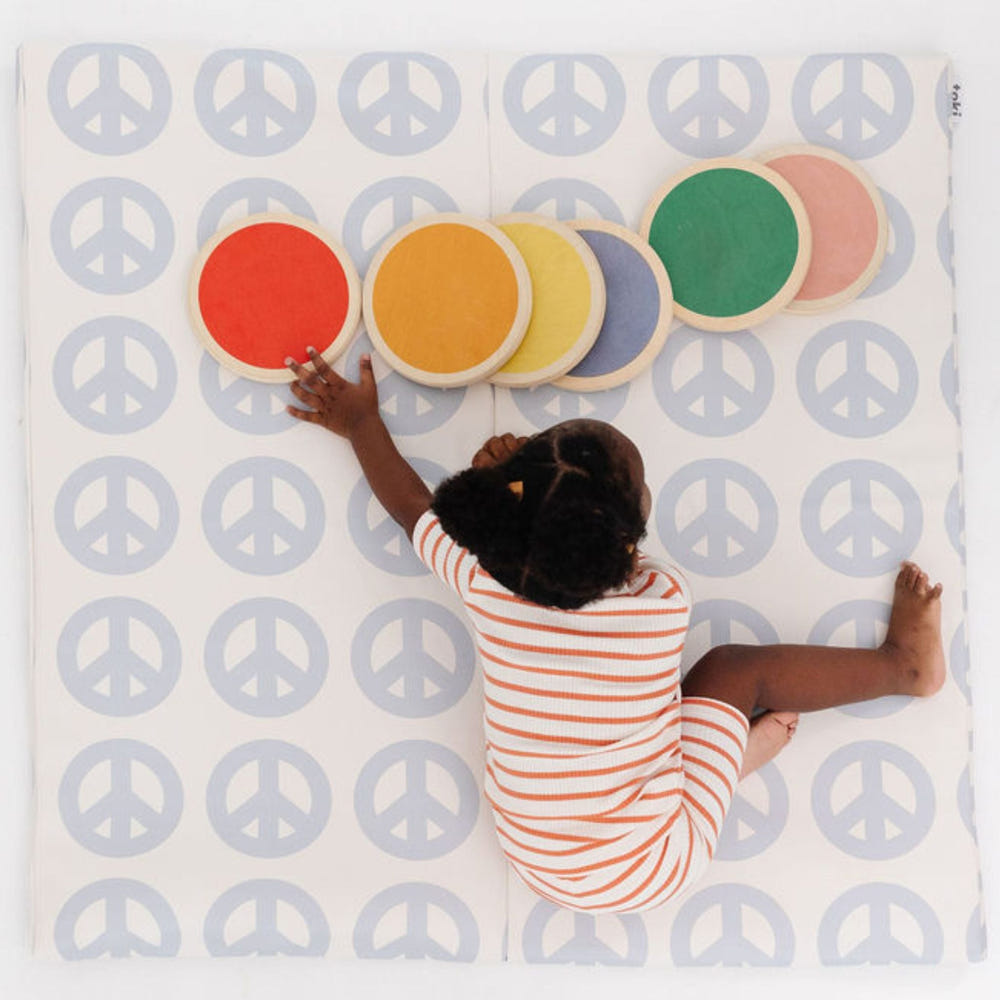 Peace Sign Vegan Leather Mat for babies - stylish and safe play mat for fun and comfort.