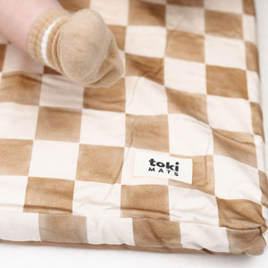 Checker Toffee Organic Cotton Mat for babies, perfect for playtime, shown from angle 11.