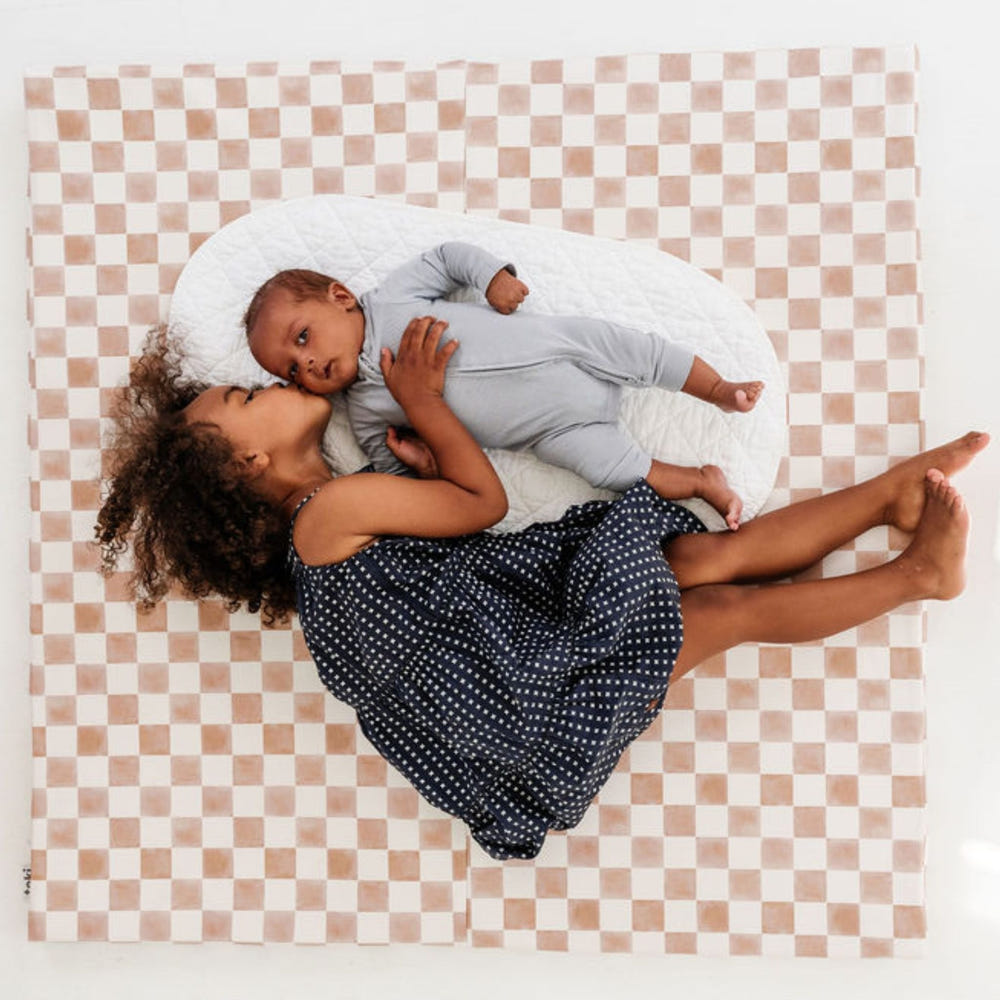 Checker Toffee Vegan Leather Mat - Stylish, durable play mat for babies, perfect for safe and comfortable playtime.