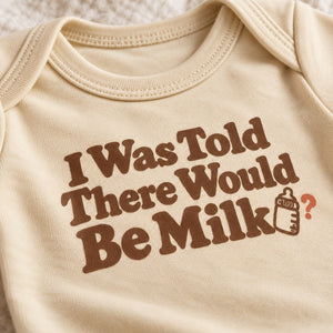 Close-up of the I Was Told There Would Be Milk baby bodysuit print