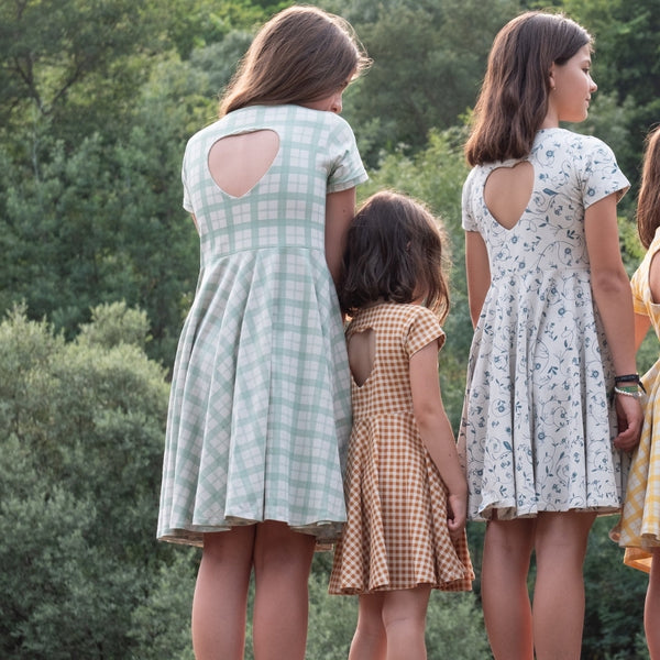 Sweetheart Twirl Dress in Fern Plaid, organic cotton jersey, perfect for baby swimwear, angle view 7.
