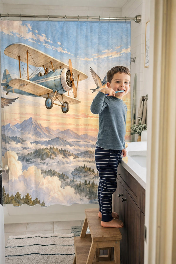 Child brushing teeth in a family bathroom with the Birds and Biplane shower curtain