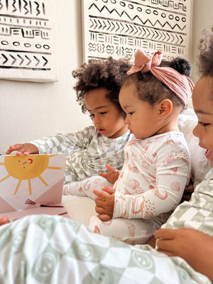 "Shwally Romper for babies, stylish design, angle view showcasing soft fabric and vibrant colors."