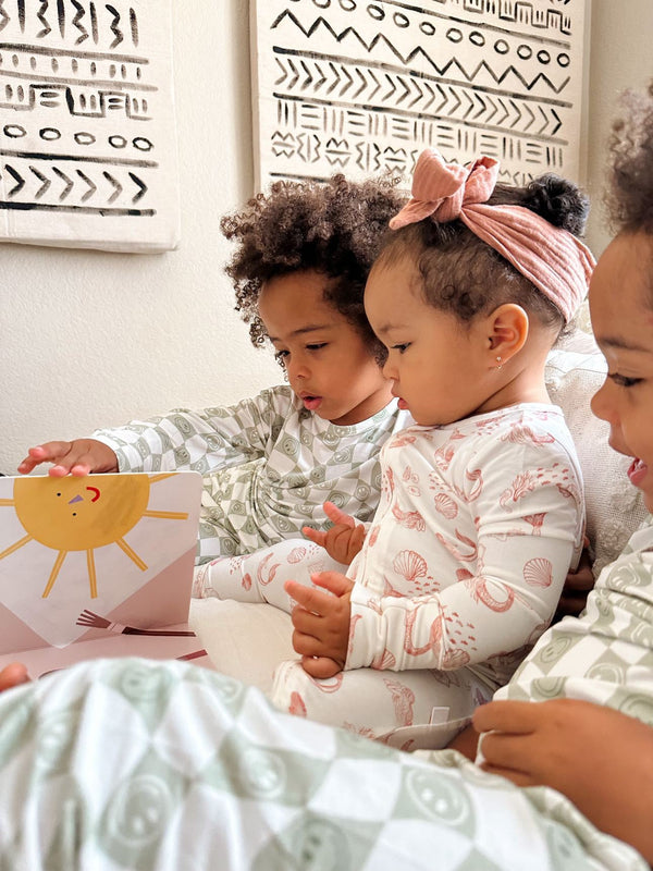 "Shwally Romper for babies, stylish design, angle view showcasing soft fabric and vibrant colors."