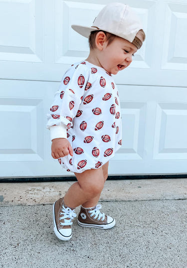 Football print bamboo bubble romper for babies, perfect for playful and stylish outfits.