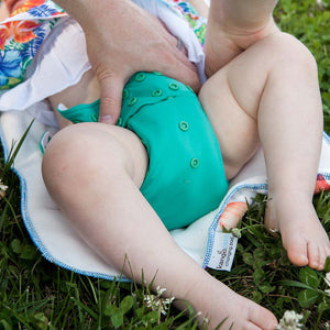 Rumparooz OBV G3 One Size Pocket Cloth Diaper in Atlantis Teal, angle view, perfect for eco-friendly baby bedding.