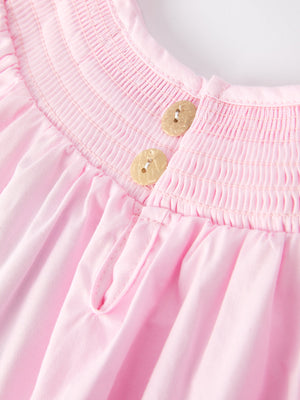 White bow smock embroidered pink dress for babies, stylish and cute, showcased from angle 5.