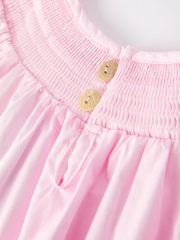 White bow smock embroidered pink dress for babies, stylish and cute, showcased from angle 5.