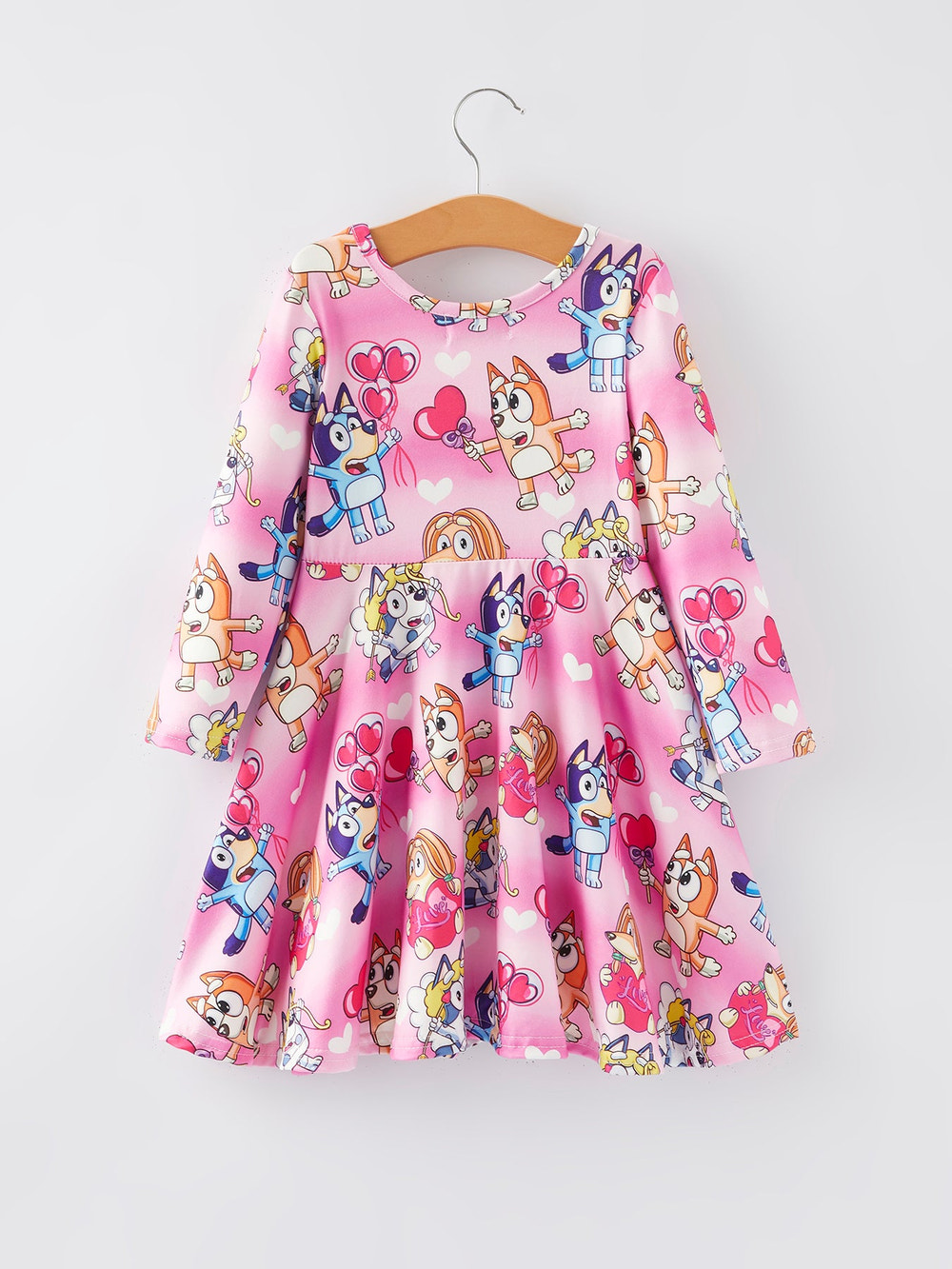 Pink print long sleeve twirly dress for girls, perfect for playful and stylish outfits.