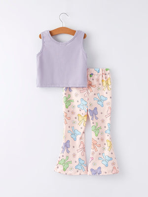 Purple girls' top with bow and floral print bell bottom pants set, stylish outfit for toddlers, angle view 2.