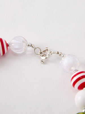 Cute vintage cherry pendant necklace for babies, perfect accessory for seasonal wear. Angle 3 view.