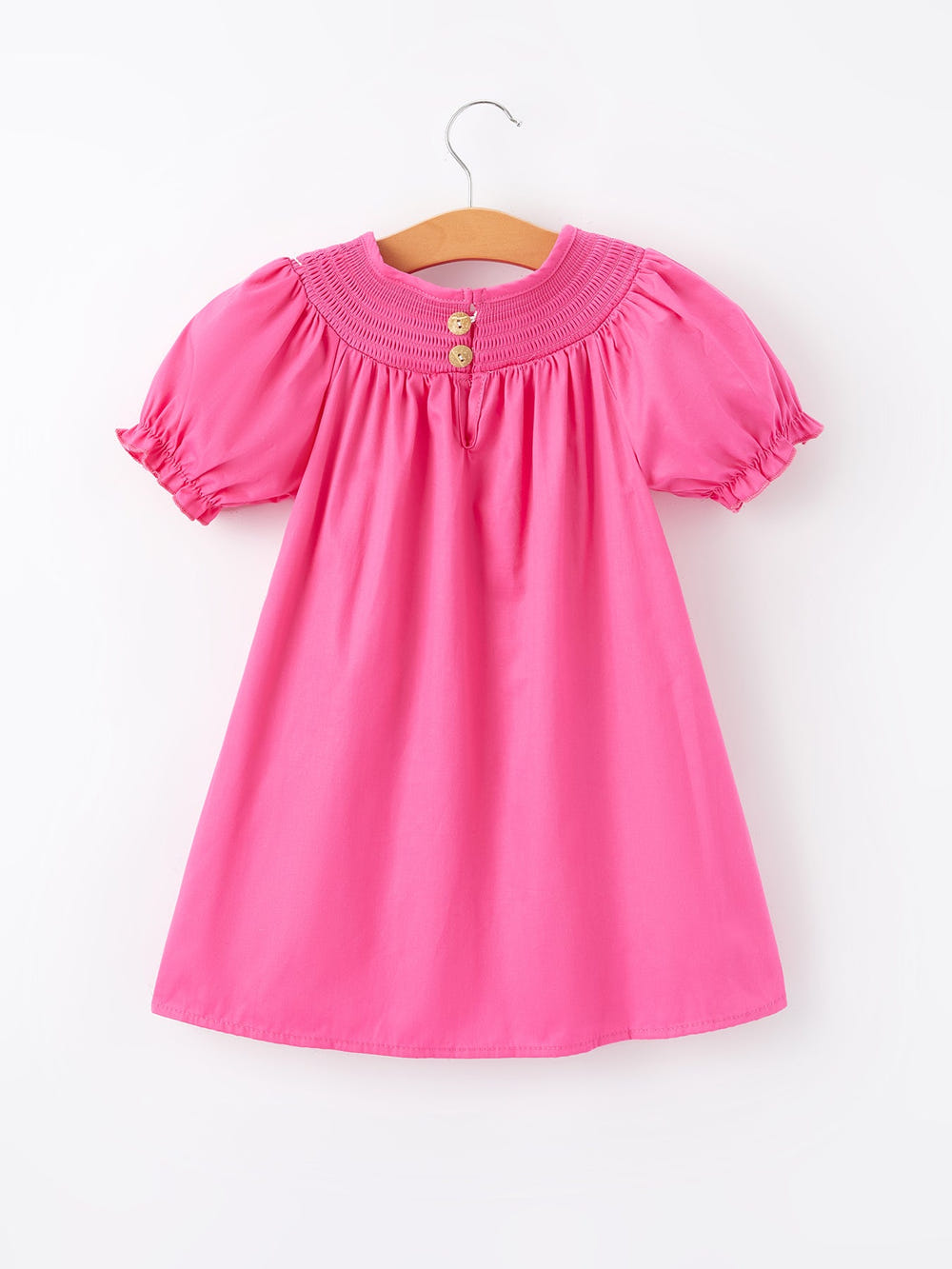 Girls hot pink dress with bow smocking embroidery, perfect for special occasions and everyday wear.