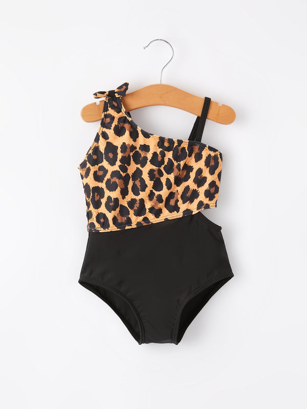 Leopard print girls' swimsuit for stylish summer fun, perfect for beach days and pool parties.