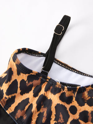 Leopard print girls' swimsuit, stylish and fun for summer days at the pool or beach. Angle 4 view.