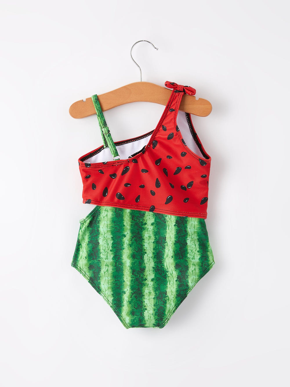 Two-piece swimsuit with watermelon pattern on a white background