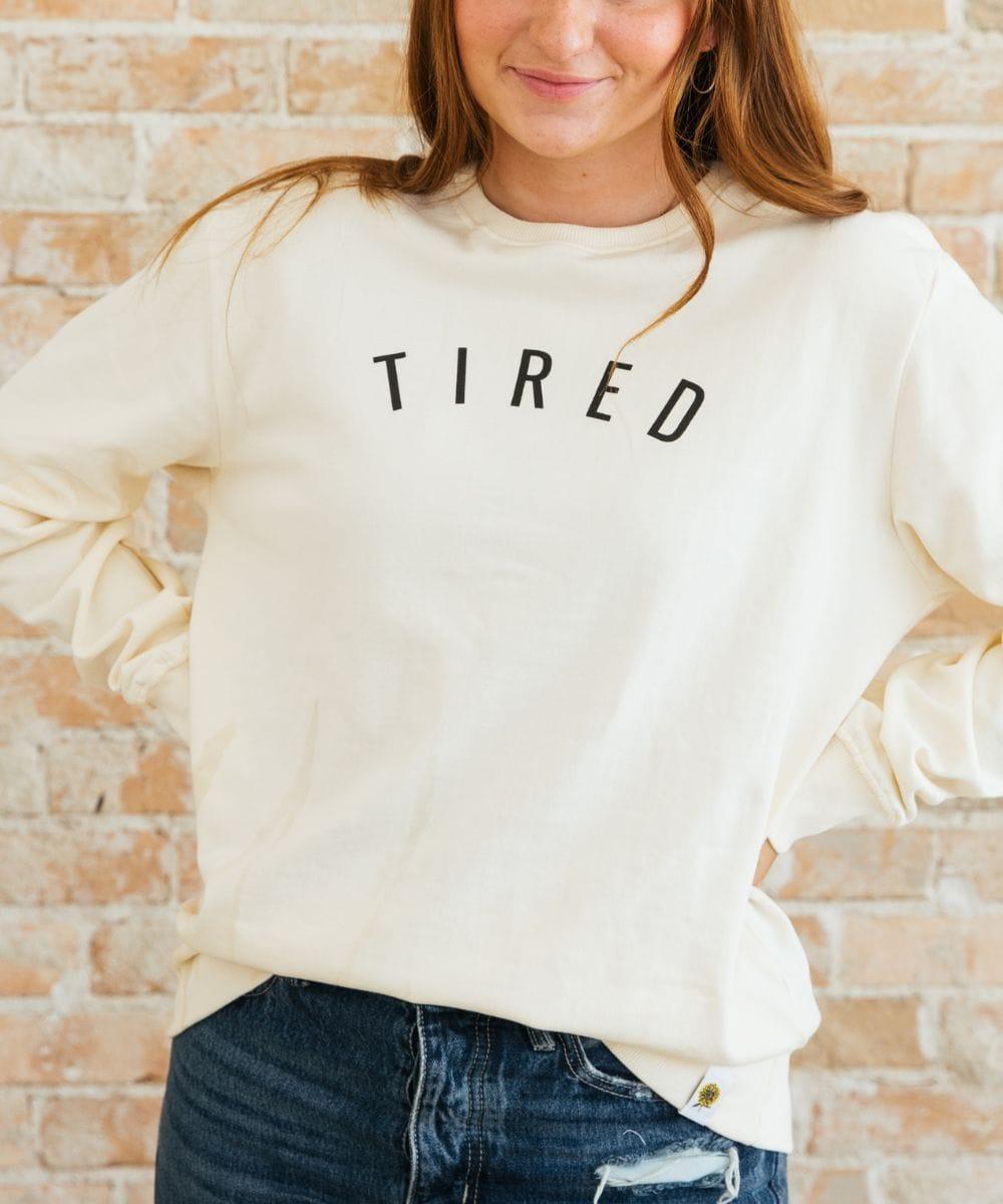 Cozy Tired Sweatshirt for babies, perfect for comfort and style in any season.