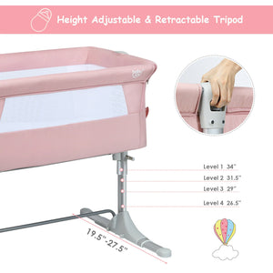 Portable baby bed side sleeper bassinet crib with carrying bag, angled view showcasing its compact design.