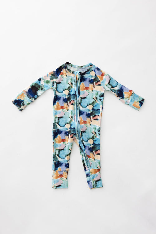 Bamboo zip pajamas in Charli print for babies, featuring a cozy design and soft fabric. Angle 7 view.