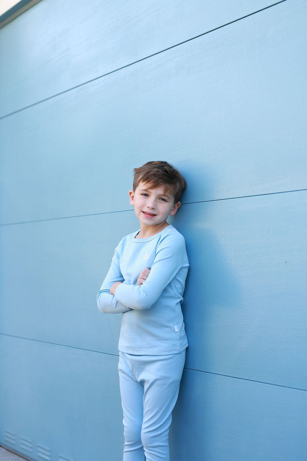 Bright blue stitched PJ for babies, cozy and stylish, perfect for comfortable sleep and play.