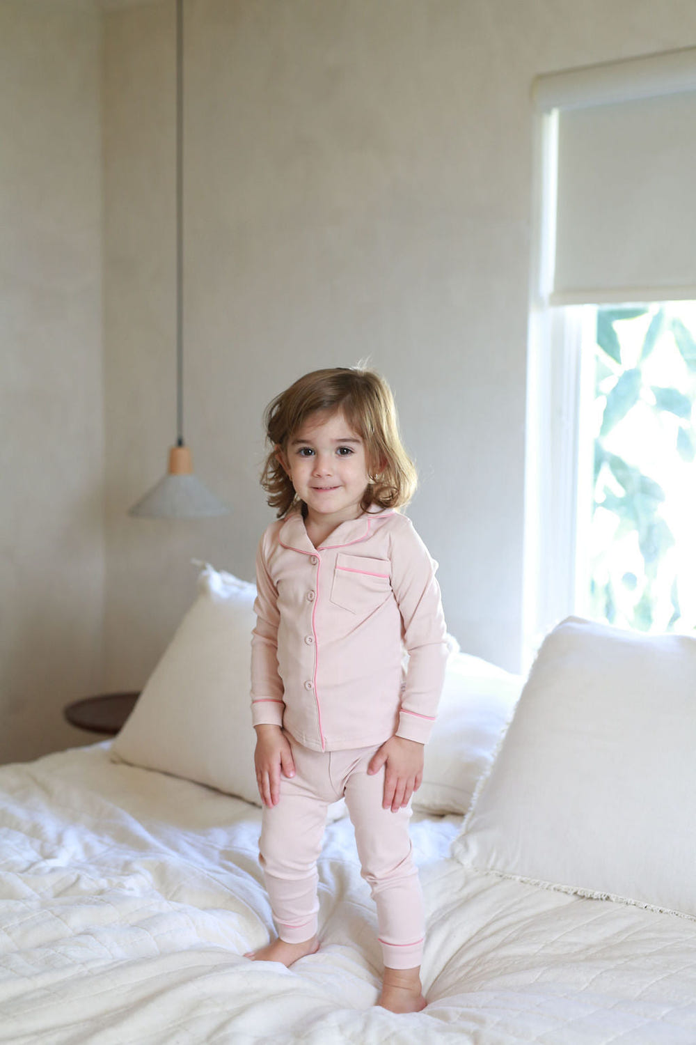 Grandpa PJ in pink and fuchsia for babies, cozy sleepsuit perfect for bedtime comfort and style.